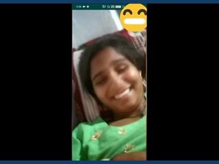 A village girl flaunts her breasts in a video