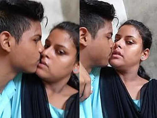 Two young Indian lovers passionately kiss in a steamy video