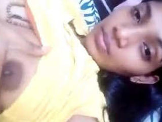 Watch a Desi babe flaunt her boobs and pussy in this steamy video