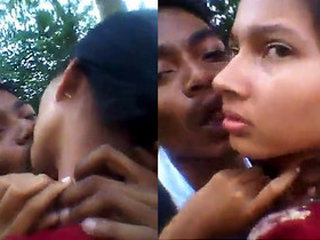 Outdoor smooching between lovers with passion and desire