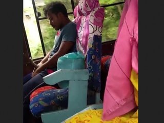 Gay man masturbates on a bus while being watched by girls